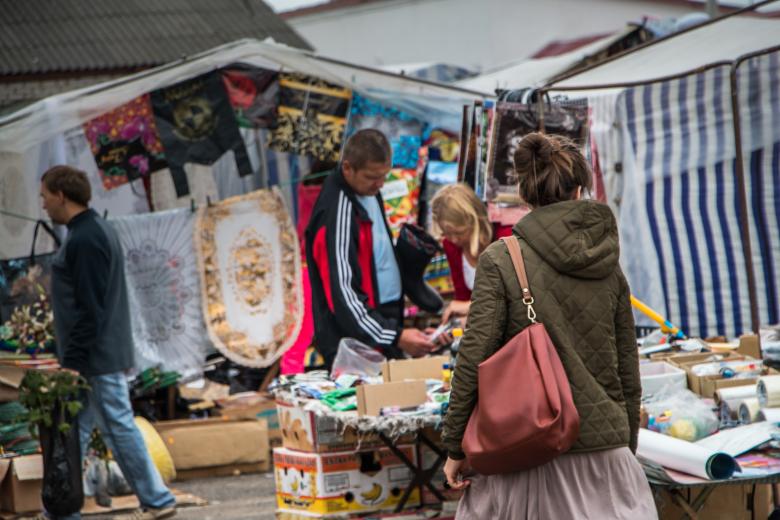 Free stock image of A woman  looking for items created by Janis Urtans