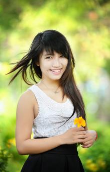 Girl with Flower - Free Stock Photo