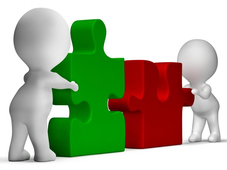 Free stock image of Jigsaw Pieces Being Joined Showing Teamwork And Collaboration created by Stuart Miles