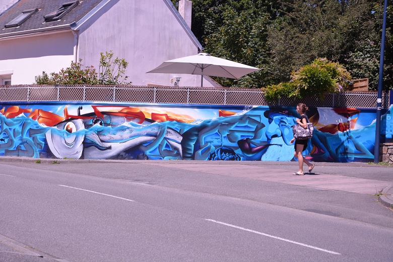 Free stock image of Woman Walking Past Graffiti Wall created by Richard Revel