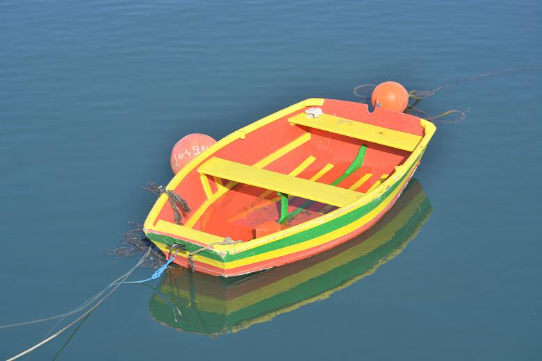 Free stock image of Orange and Yellow Rowing Boat created by Richard Revel