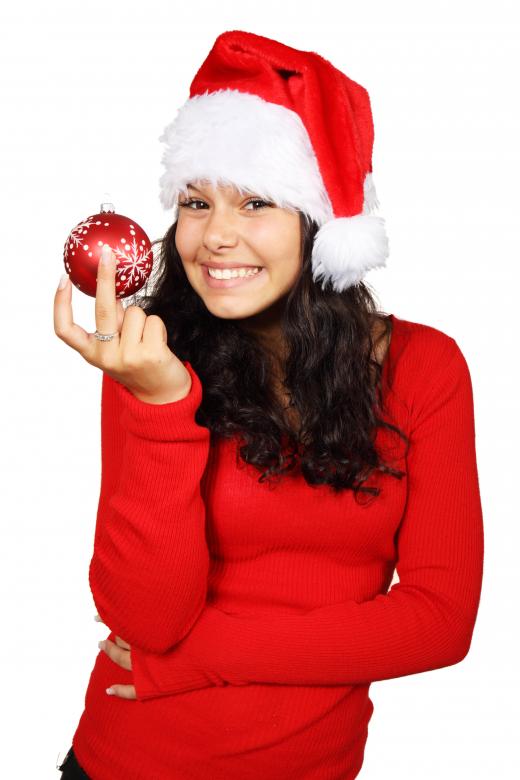 Free stock image of Girl with Bauble created by Pixabay