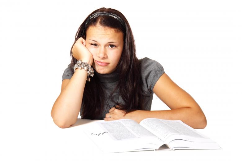 Free stock image of Girl reading a Book created by Pixabay
