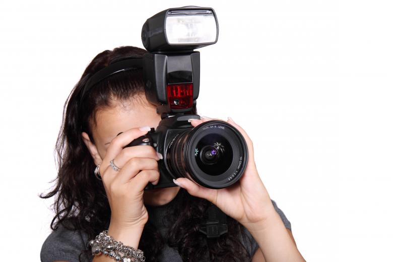Free stock image of Girl with Camera created by Pixabay