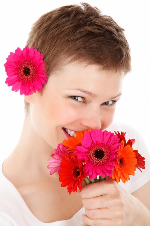 Free stock image of Girl with Flowers created by Pixabay