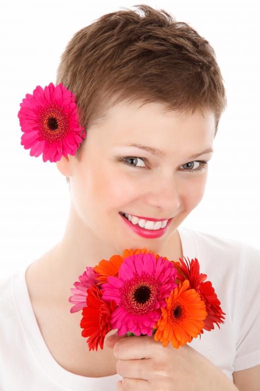 Free stock image of Girl with Flowers created by Pixabay