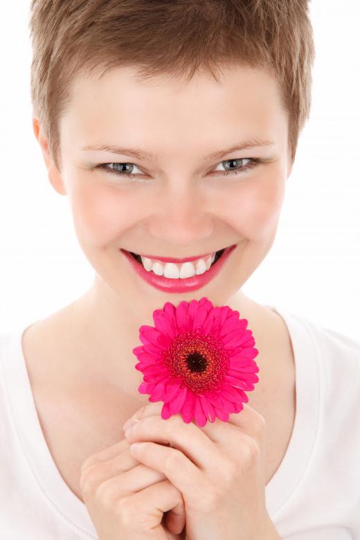 Free stock image of Girl with Flower created by Pixabay