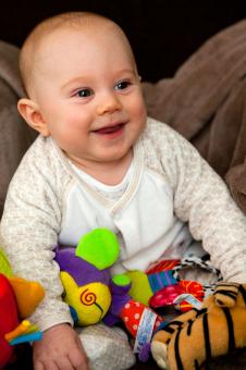 Free Stock Photo of Kid with Toys