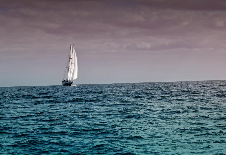 Free stock image of Sail Boat Under Dark Skies created by Jack Moreh