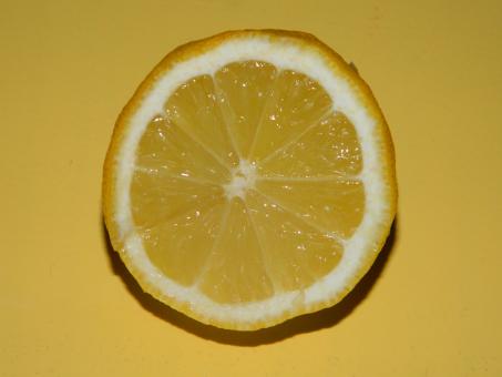 Lemon on Yellow Background - Free Stock Photo