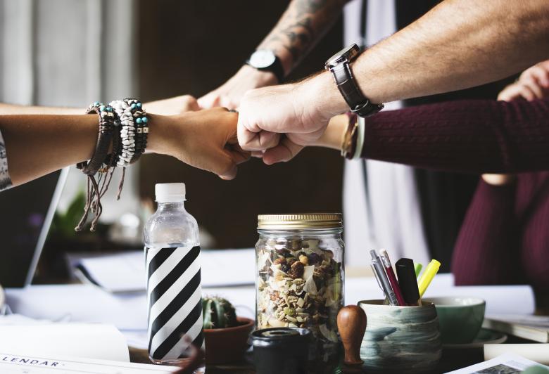 Free stock image of Fists at a Meeting created by Pixabay