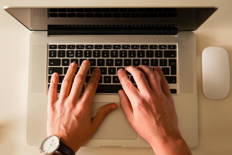 Free stock image of Using Laptop created by Pixabay