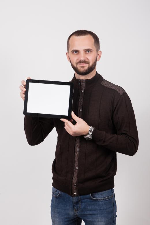 Free stock image of Man Holding a Tablet created by Ilona Hrechkina