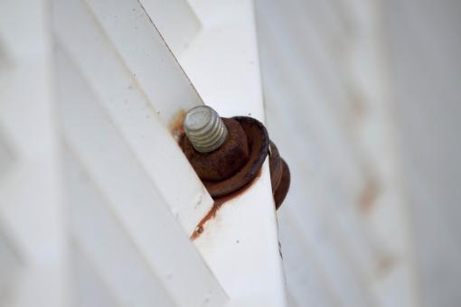 Free Stock Photo of Rusted Bolt in Metal