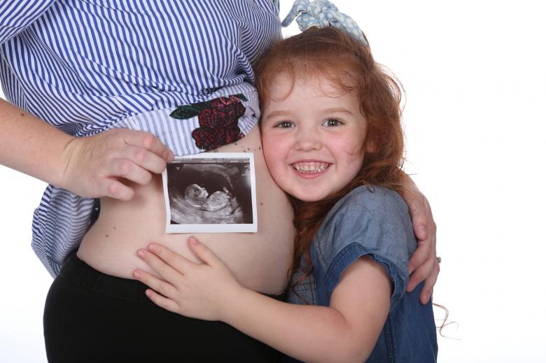 Free stock image of Sister meets new baby created by Christopher Terrance Owen