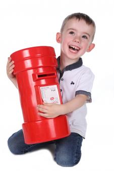 Happy Boy with Red Postbox - Free Stock Photo
