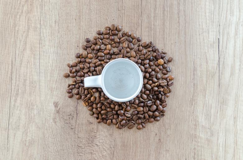 Free stock image of White Cup and Coffee Beans on Wooden Table created by Lukas