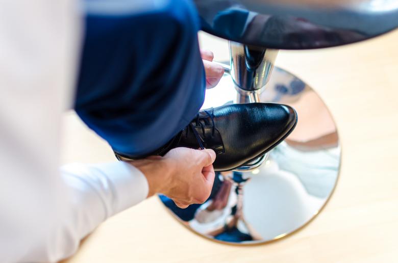 Free stock image of Man Putting on Shoes for Wedding created by Lukas