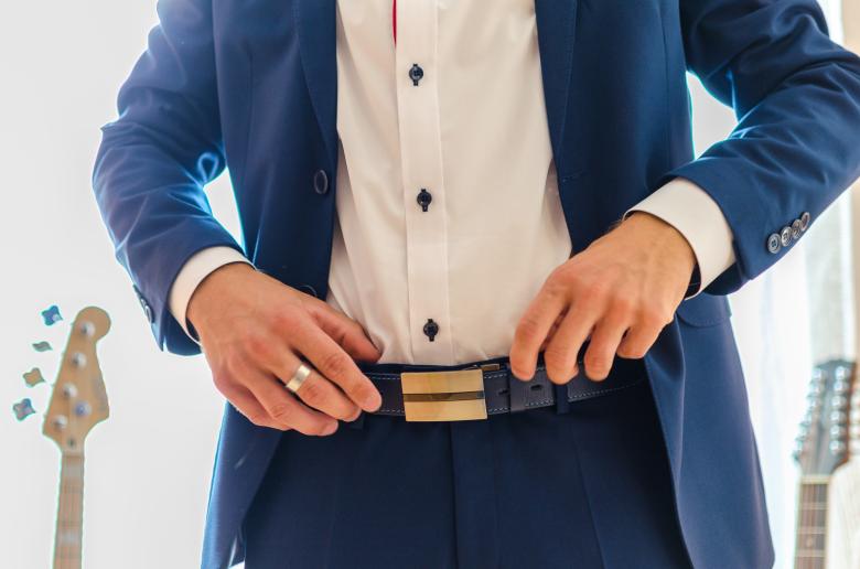 Free stock image of Man Fixing his Belt created by Lukas