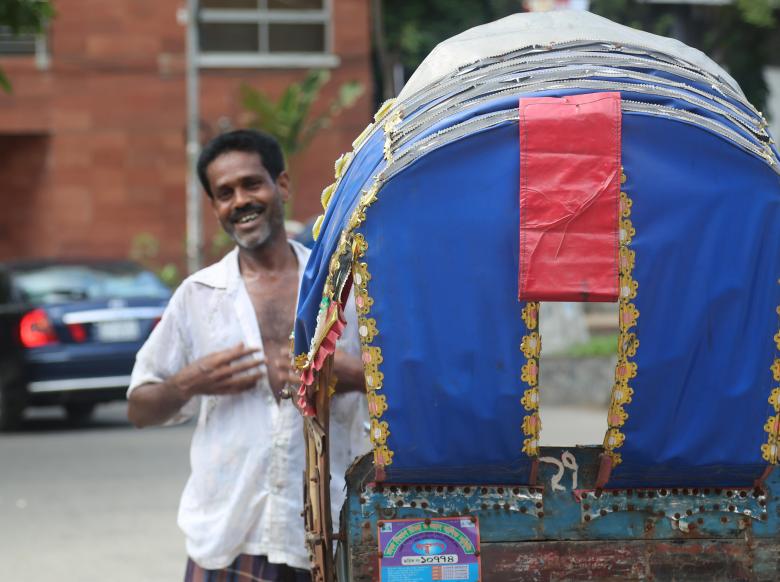 Free stock image of Smiling Rickshaw Driver created by Md. Sharif Arefin Badhan