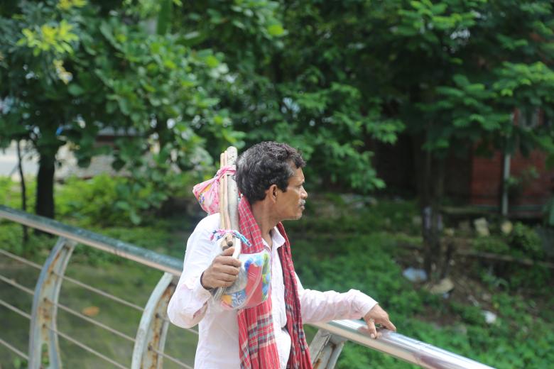 Free stock image of Man Looking over the Rail created by Md. Sharif Arefin Badhan