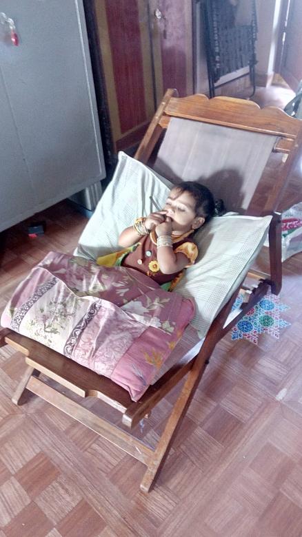 Free stock image of My baby watching TV created by Kanduri Narasimha Charyulu