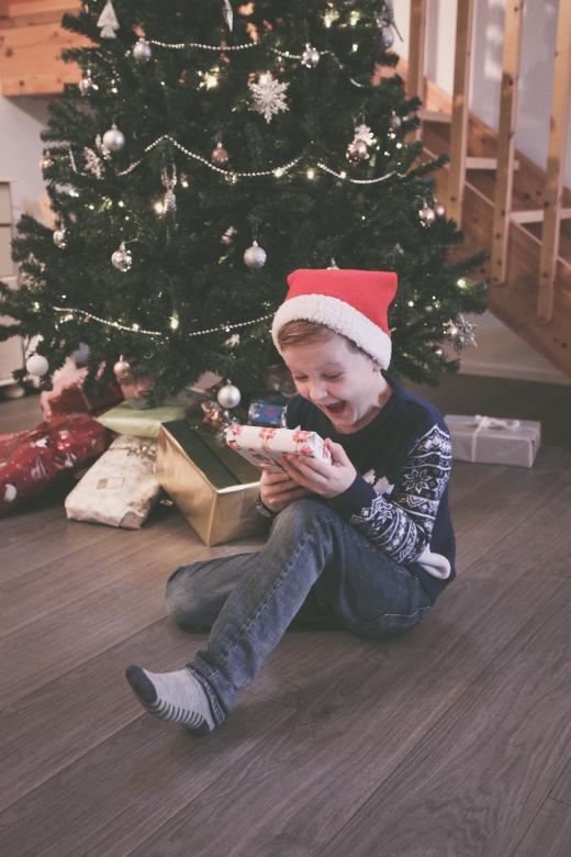 Free stock image of Excited Boy Opening His Christmas Presents created by Bjorgvin
