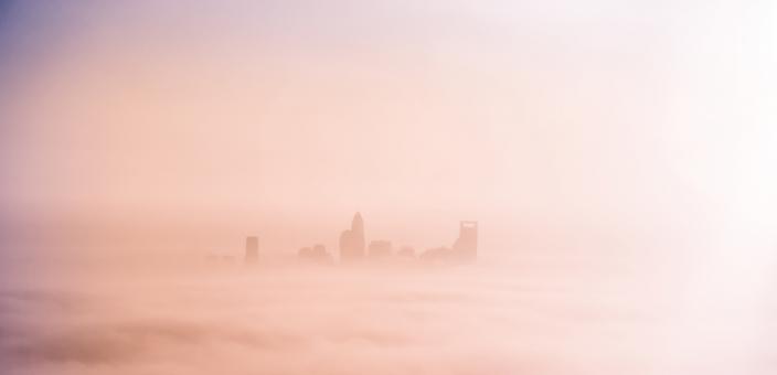 Free Stock Photo of City Above the Clouds
