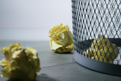 Crumbled Paper Balls Near Trash - Free Stock Photo