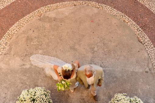Bride and Father Walking Into Church