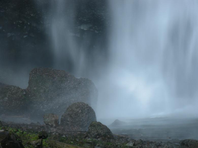 Free stock image of Misty Waterfall with Dark Rocks in Foreground created by Lindy Thibodaux