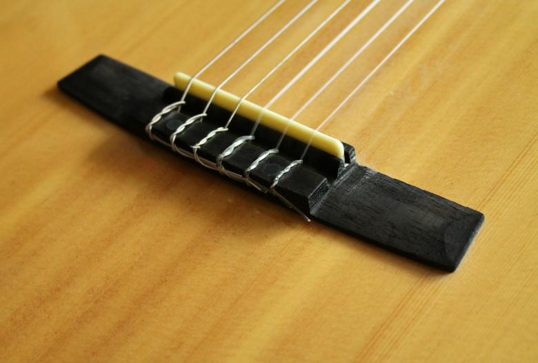 Free stock image of Guitar Saddle & Bridge created by NomeVizualizzato