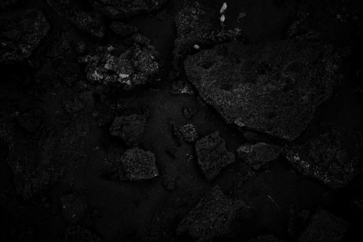 Free Stock Photo of Black Lava Rock and Sand