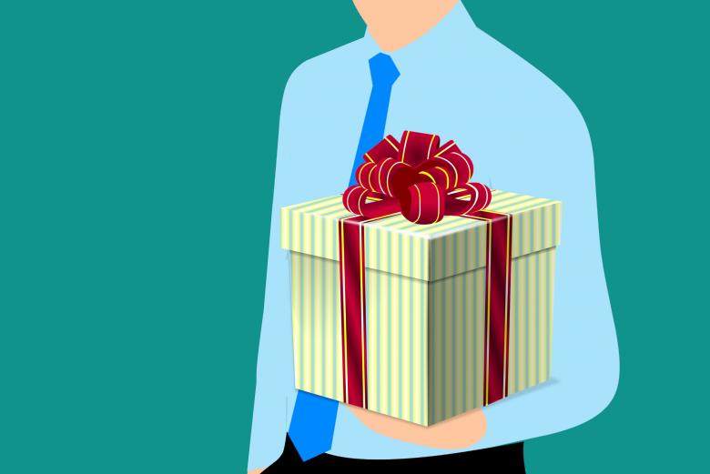 Free stock image of Man Holding Gift created by mohamed hassan