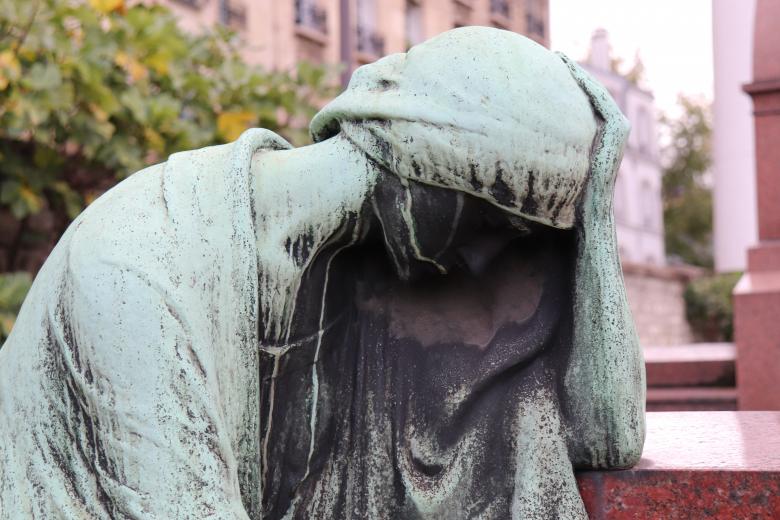 Free stock image of Desperate woman on a grave created by GAIMARD Jacques