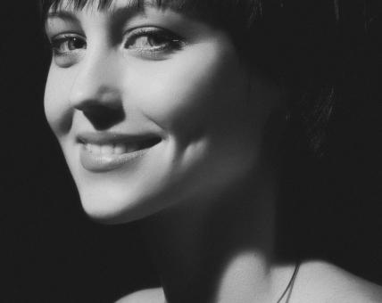 Smiling Girl in Black and White - Free Stock Photo
