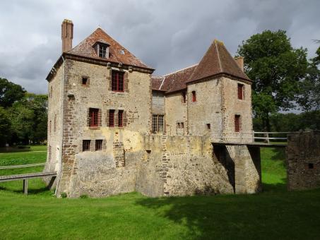 Free Stock Photo of Small castle surrounded by dry moats