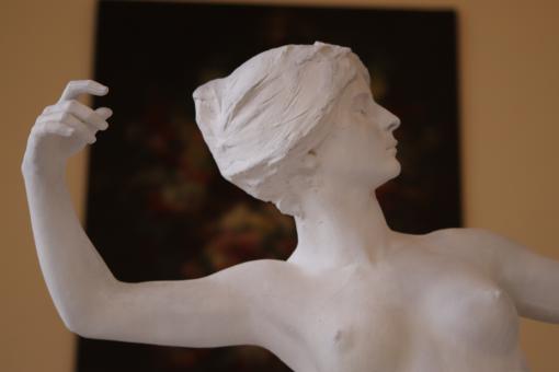Sculpture of young lady with a bow - Free Stock Photo
