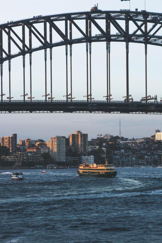 Free stock image of Ferry underneath Sydney Harbour Bridge created by Tom Hill