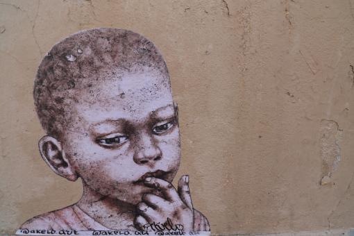 Free Stock Photo of Graffiti of child on a wall