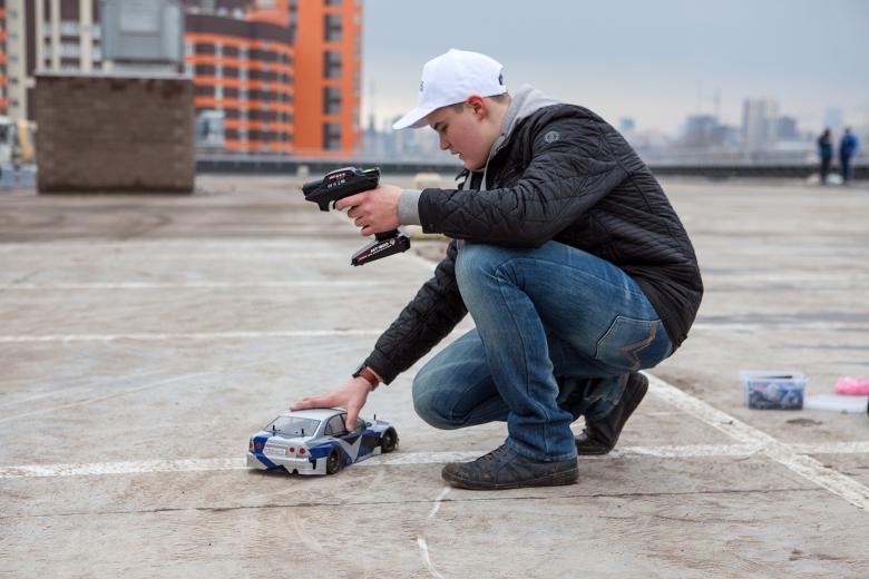 Free stock image of Boy with Electric Toy Car created by 2happy