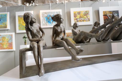 Tiny bronze sculptures in an art exhibition - Free Stock Photo