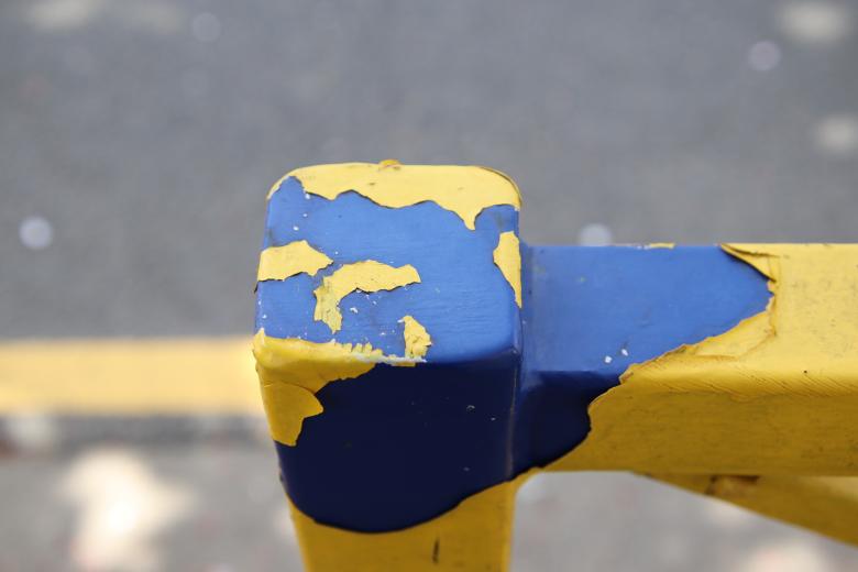 Free stock image of Peeled yellow paint on blue rail created by GAIMARD Jacques