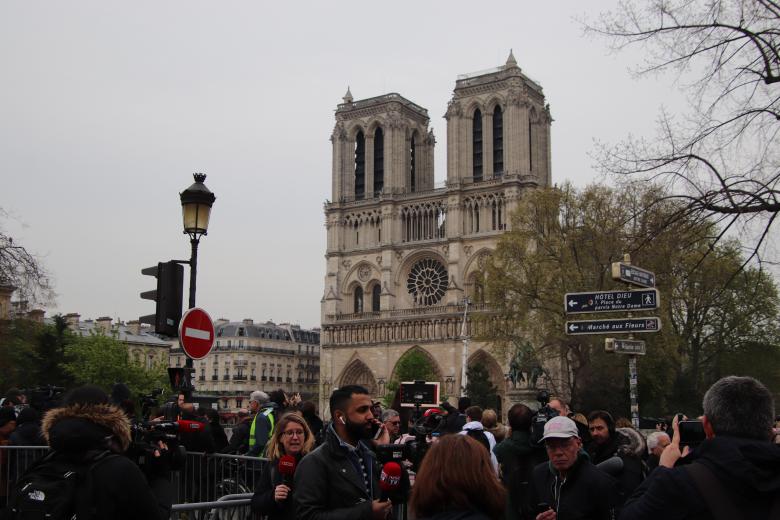 Free stock image of Onlookers facing the Notre Dame Cathedral created by GAIMARD Jacques