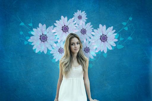 Attractive Young Woman Over Blue Wall with Flowers - Free Stock Photo