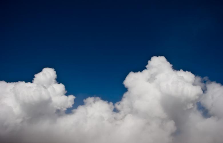 Free stock image of White Clouds on Blue Sky created by Bjorgvin
