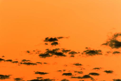 Orange sky and black clouds background - Free Stock Photo