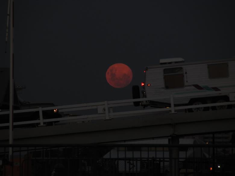 Free stock image of Red moon over Melbourne evening sky created by Michiru Maeda
