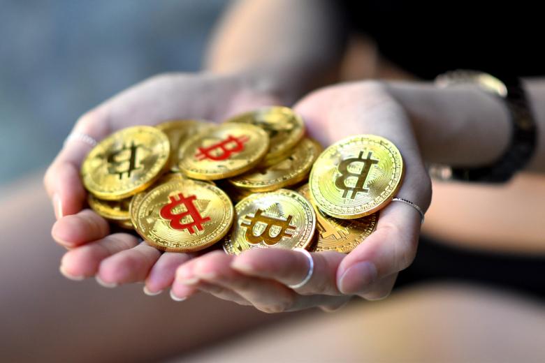 Free stock image of Handful of Bitcoins created by Photography Art