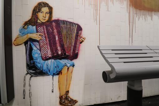 Free Stock Photo of Graffiti of woman playing accordion